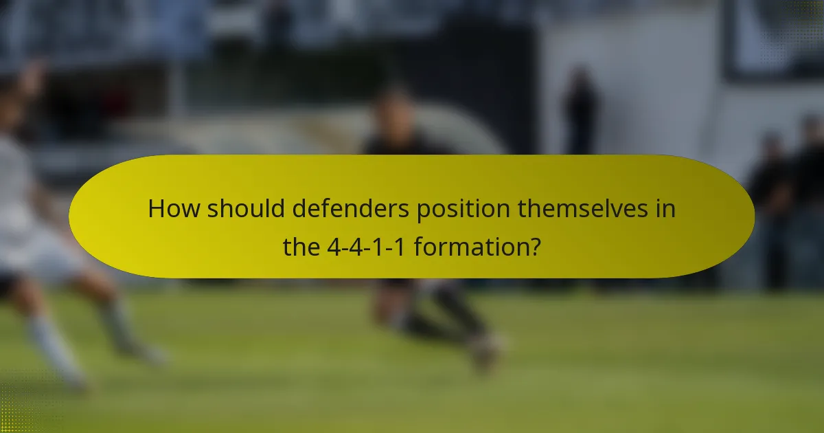 How should defenders position themselves in the 4-4-1-1 formation?